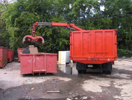Front view of commercial waste containers outside a Bracknell business premises